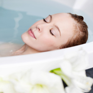 relaxed woman taking a spa-like bath